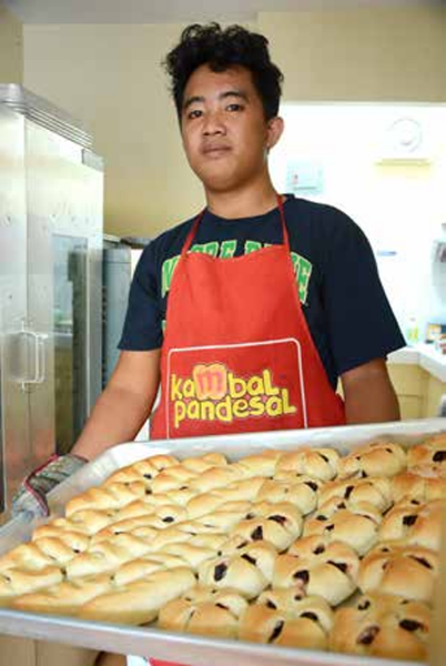 Joven Lolo, Jan Michael's brother helps run the bakery.